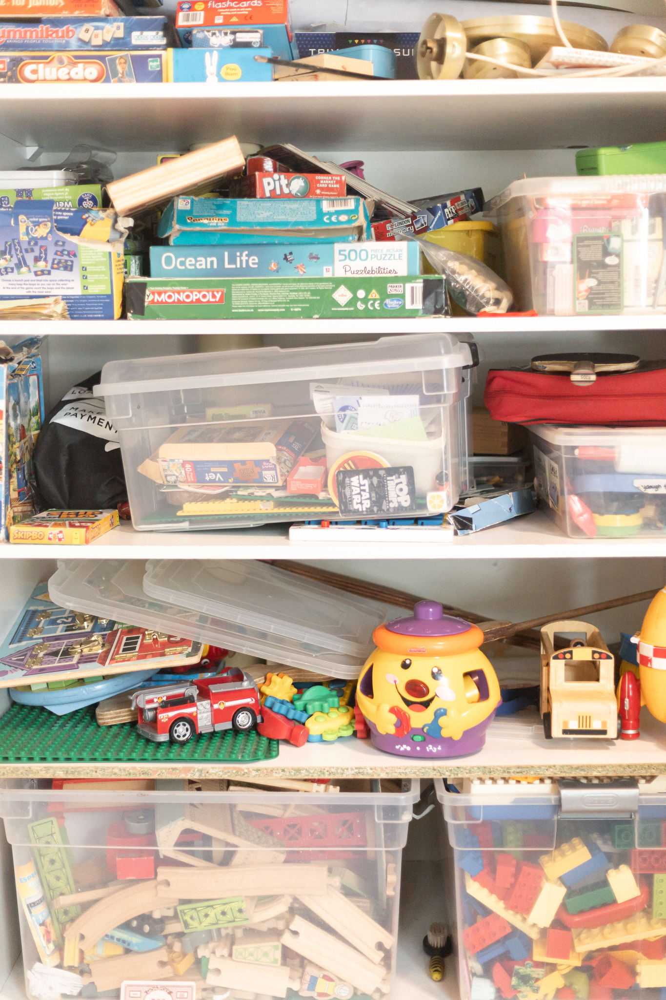 Before Sorted toys and games cupboard