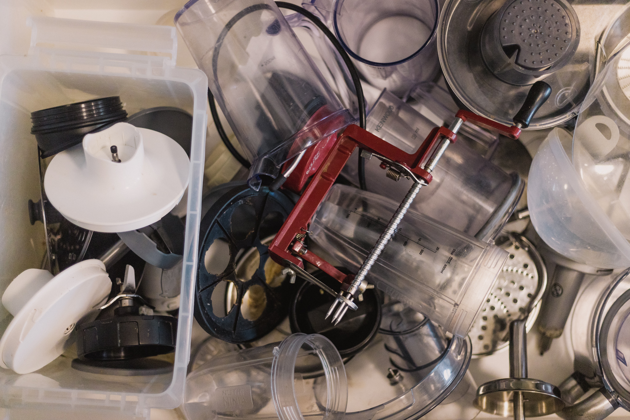 Before Sorted kitchen appliances drawer